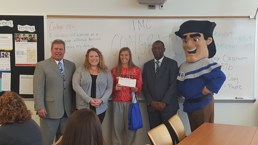 Rachel Hardtke surrounded by President of Thomas More College, Counselor, Principal and the mascot